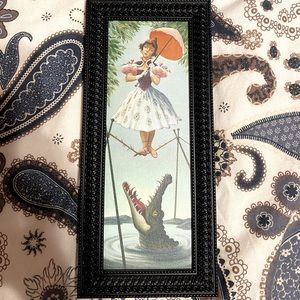 Disneys Haunted Mansion tightrope walker painting
